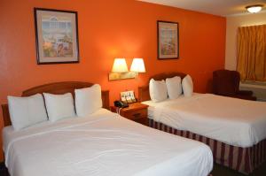 Postel nebo postele na pokoji v ubytování Americas Best Value Inn Gainesville TX
