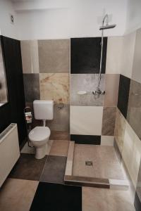 A bathroom at Foltos Bagoly Vendégház
