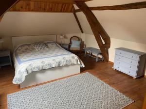 Giường trong phòng chung tại Maison 6 personnes La Tourelle