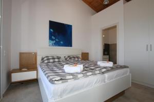 Postel nebo postele na pokoji v ubytování Sunset Sea View Villa 3 + 37 fotografií