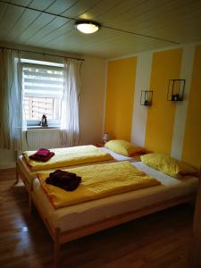 
Ein Bett oder Betten in einem Zimmer der Unterkunft KreTa
