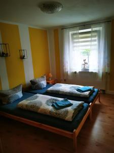 Postel nebo postele na pokoji v ubytování Sonnengarten