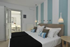 Posteľ alebo postele v izbe v ubytovaní Romantica Suites