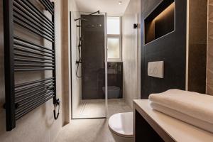 Kúpeľňa v ubytovaní Caldo Luxury Rooms + 22 fotografií