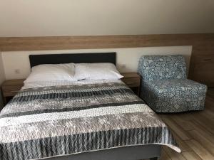 Pokoje nad Morzem客房内的一张或多张床位