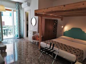 Postel nebo postele na pokoji v ubytování A Polignano Rooms