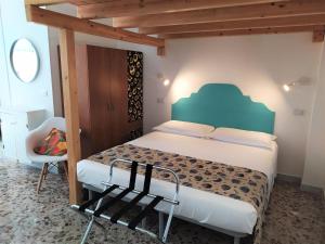 Postel nebo postele na pokoji v ubytování A Polignano Rooms