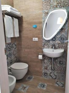 Koupelna v ubytování A Polignano Rooms