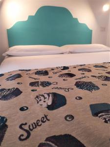 Postel nebo postele na pokoji v ubytování A Polignano Rooms