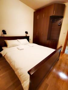 Postel nebo postele na pokoji v ubytování Panorama Zlatibor