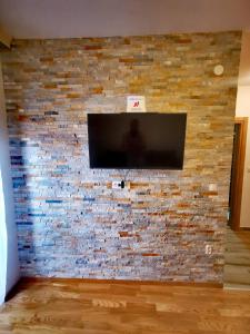 TV a/nebo společenská místnost v ubytování Panorama Zlatibor