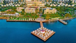an aerial view of a resort on the water at Baia Bodrum Hotel in Gundogan