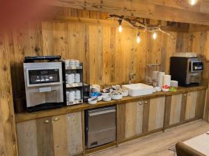 Köök või kööginurk majutusasutuses Hotel Le Clou