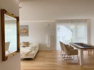 Posezení v ubytování Weingut-Aparthotel Olinger