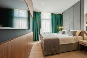 Posteľ alebo postele v izbe v ubytovaní Caldo Luxury Rooms