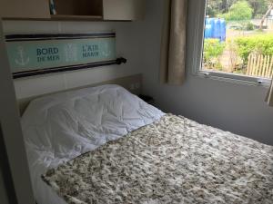 Mobilhomes Quiberon Camping Conguel - Bord de Mer 객실 침대