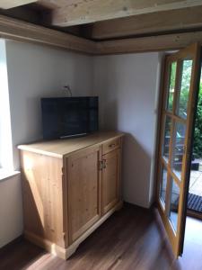 TV a/nebo společenská místnost v ubytování Appartments Haus Rettenmoser