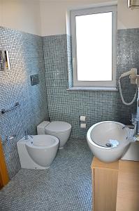 Koupelna v ubytování Hotel Paclà
