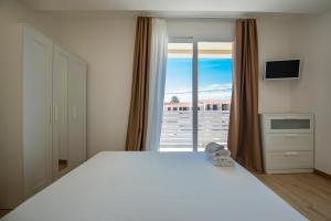 Posteľ alebo postele v izbe v ubytovaní Charming House Truvatura - Sicilia Vacanza + 37 fotografií