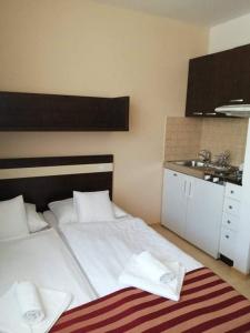Posteľ alebo postele v izbe v ubytovaní Apartmán Raja Bešeňová - Hotel Bešeňová