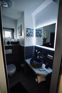 Kúpeľňa v ubytovaní Tinytimeout Westerwald