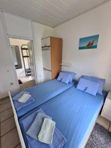 Postel nebo postele na pokoji v ubytování Apartman Tamy