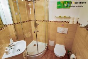 Łazienka w obiekcie Baltic Apartments - Rezydencja Bursztyn