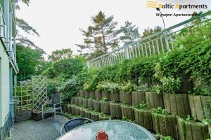 Ogród w obiekcie Baltic Apartments - Rezydencja Bursztyn