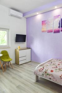 Кровать или кровати в номере Cozy apartment close to Dubrovnik