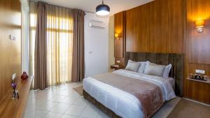 Postel nebo postele na pokoji v ubytování Sables D'or Appart Hôtel