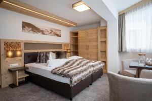 Postel nebo postele na pokoji v ubytování Hotel Victoria