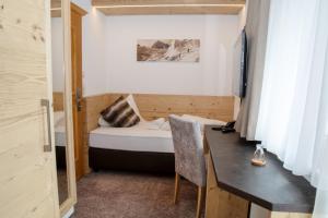 Postel nebo postele na pokoji v ubytování Hotel Victoria