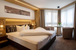 Postel nebo postele na pokoji v ubytování Hotel Victoria