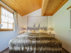 Ein Bett oder Betten in einem Zimmer der Unterkunft Holiday Apartements by Hotel Grüner Baum Feldberg