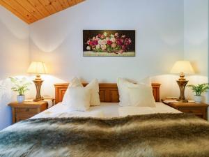 Ein Bett oder Betten in einem Zimmer der Unterkunft Holiday Apartements by Hotel Grüner Baum Feldberg
