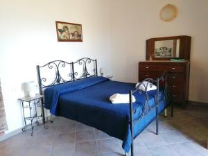 Tempat tidur dalam kamar di Agriturismo Fontevecchia