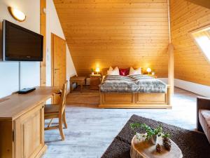 TV/Unterhaltungsangebot in der Unterkunft Holiday Apartements by Hotel Grüner Baum Feldberg