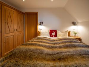 Ein Bett oder Betten in einem Zimmer der Unterkunft Holiday Apartements by Hotel Grüner Baum Feldberg
