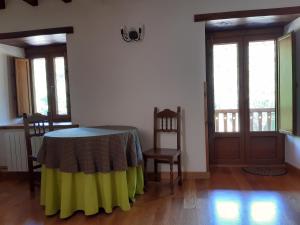 Łóżko lub łóżka w pokoju w obiekcie Casa Santa Leocadia