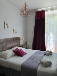Postel nebo postele na pokoji v ubytování Ma Petite Auberge