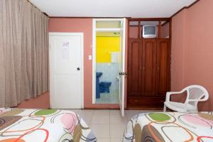 Letto o letti in una camera di Hostal Rossy