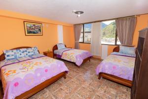 Letto o letti in una camera di Hostal Rossy