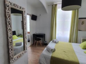 Postel nebo postele na pokoji v ubytování Ma Petite Auberge