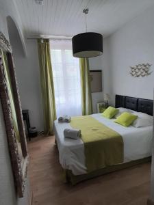 Postel nebo postele na pokoji v ubytování Ma Petite Auberge