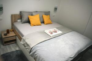 Una cama o camas en una habitación de Klikly