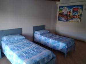 A bed or beds in a room at Porta del cilento