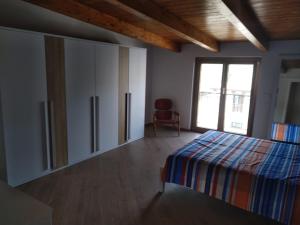 A bed or beds in a room at Porta del cilento