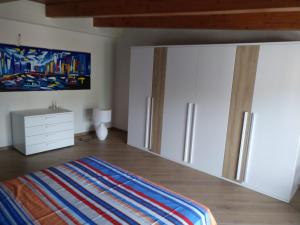 A bed or beds in a room at Porta del cilento