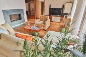 Posezení v ubytování Seehaus Lake View 3-Bedroom Apartment
