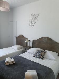 Postel nebo postele na pokoji v ubytování Ma Petite Auberge
